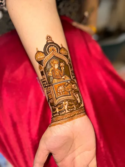 A clear, bright shot of the 'royal entry' groom design on the arm.