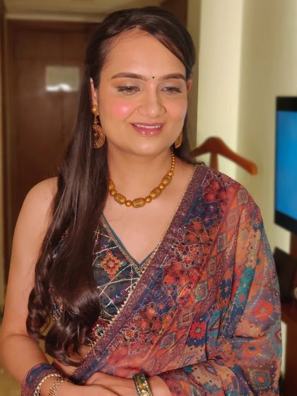 Mallika looking fresh and radiant. This is a perfect example of a "no makeup" makeup look that enhances your features without feeling heavy.