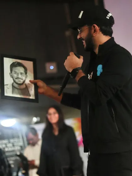 A great moment as Aman Gupta holds up my sketch of him during an event at IIT Delhi. It's always an honor when the subject of my art appreciates the work.