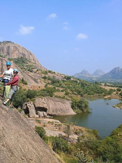 Gopika and her climbing partner on a multi pitch route with a stunning lake view. These are the moments that make the hard work of climbing worth it.