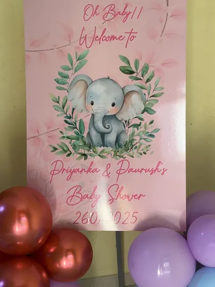 Another welcome sign option, this one featuring a cute baby elephant illustration for a jungle or safari-themed shower.