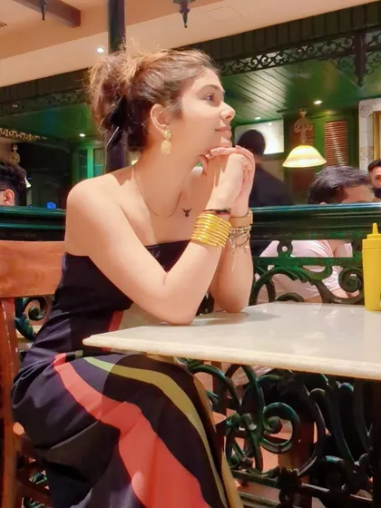 A candid moment at a cafe. This striped tube dress is simple, comfortable, and perfect for a relaxed outing.
