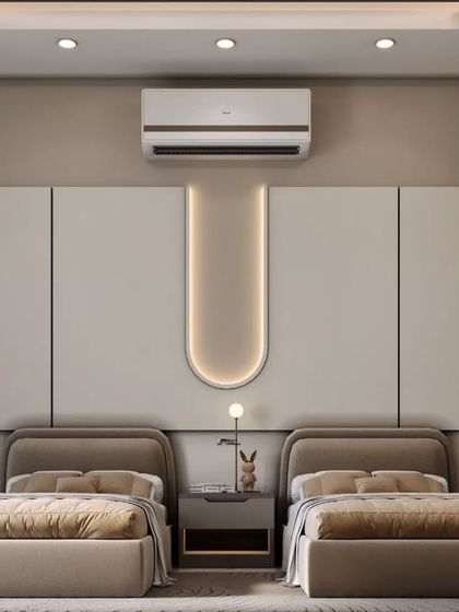 Another view of the shared bedroom, highlighting the clean lines of the twin beds and the subtle LED accent lighting on the headboard wall.