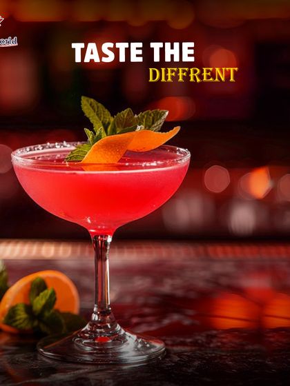 Taste the difference with this vibrant red cocktail. Garnished with an orange peel and fresh mint, it's a testament to our belief that a great drink should be a delight for all the senses.
