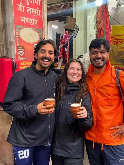 Enjoying a refreshing lassi at a local spot is a must-do on our tours. Here, our guide and guests take a break during the Krishna's Trails trip to savor an authentic taste of the region.