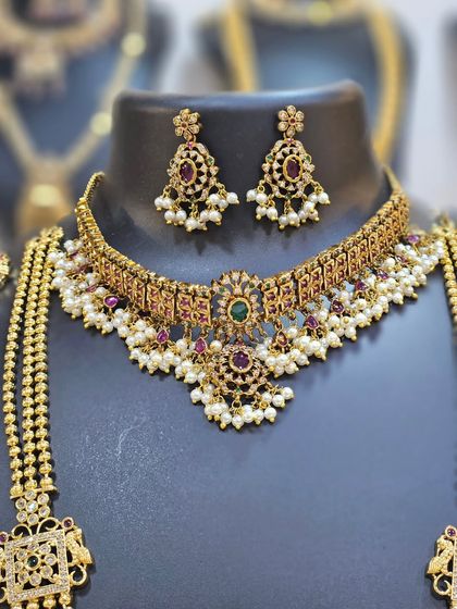 Unique caption for media id 91 describing the specific jewellery and look.