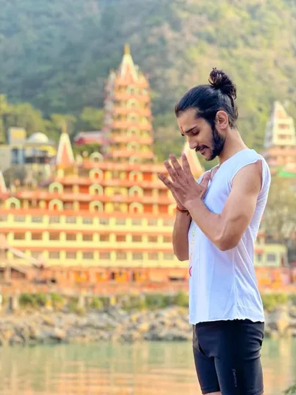 My practice is deeply rooted in the spiritual heritage of yoga, captured here in Rishikesh, the world's yoga capital. This connection to the source inspires my teaching and healing work. I believe that true wellness comes from aligning the body, mind, and spirit, a principle I bring to every session.