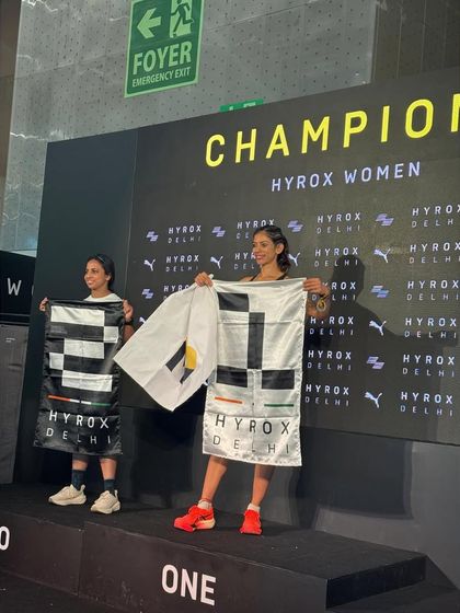 On the podium as a HYROX Women's Champion. This isn't just about winning; it's about representing the power and potential of female athletes. I am passionate about helping other women find their strength.