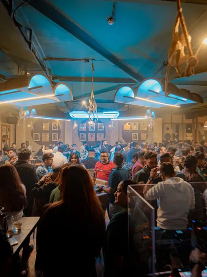 A wide shot of the packed house at Badmaash Company in Chembur. Just another Saturday night.