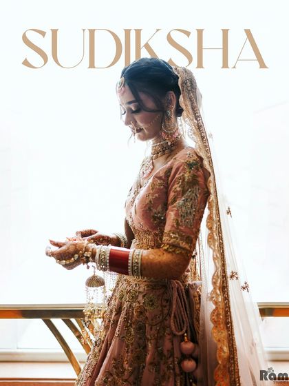 A beautiful, high-key portrait of the bride, "Sudiksha," her delicate features and outfit highlighted against a bright background.
