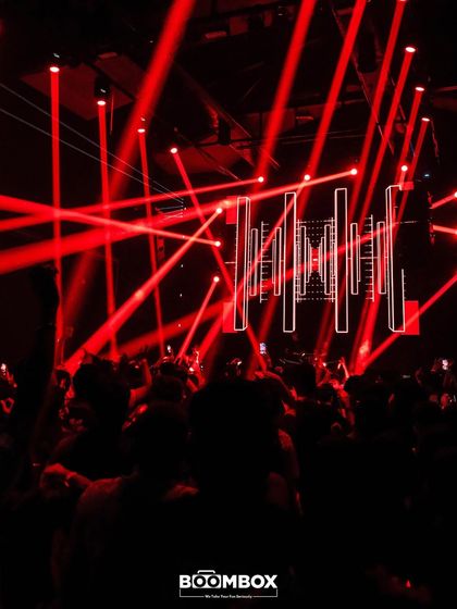 The insane red laser show at F Superclub for a sold-out show with techno act 999999999. I bring hard-hitting underground music to premier club venues.