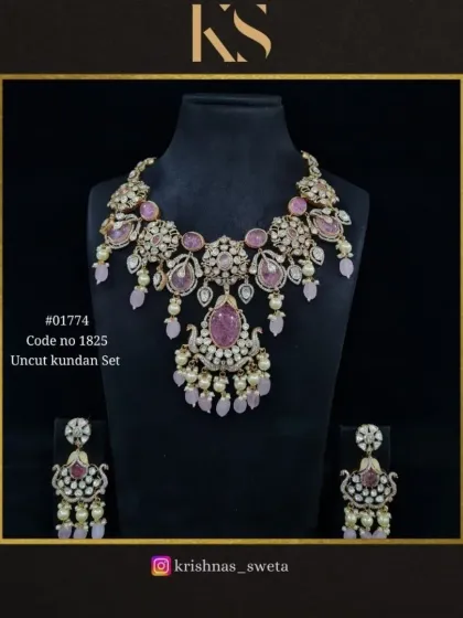 An exclusive uncut Kundan set in a soft pastel pink. This elegant necklace and earring set is perfect for a modern bride or bridesmaid.