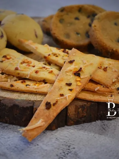 A close-up shot focusing on the savory Cheese & Spice crackers, a unique and popular recipe from my cookie workshop.