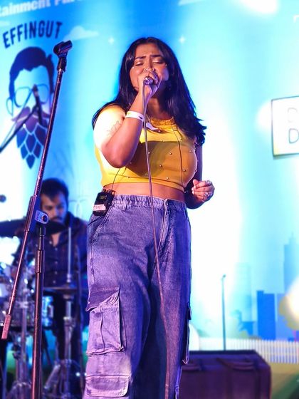 Feeling the music under the stage lights. This is the focus and passion I bring to every single song during a live concert performance.