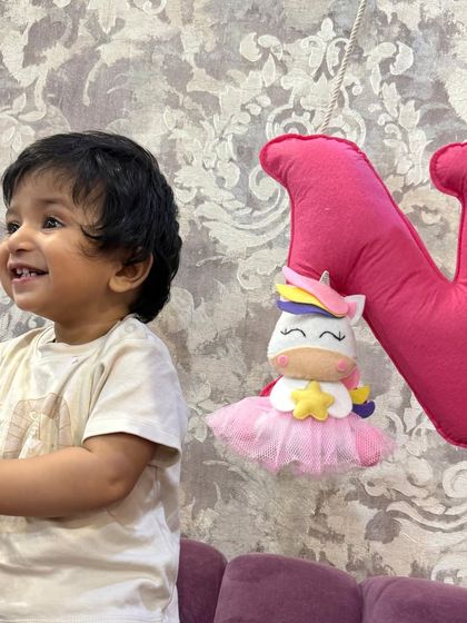 An adorable little one enjoying his Rakhi gift. These happy photos from clients truly make my day.