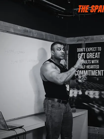 A recap from my Spartan's Elite Contest Prep Workshop. Here I am at the whiteboard, breaking down complex topics. My goal is to educate the next generation of athletes and coaches.