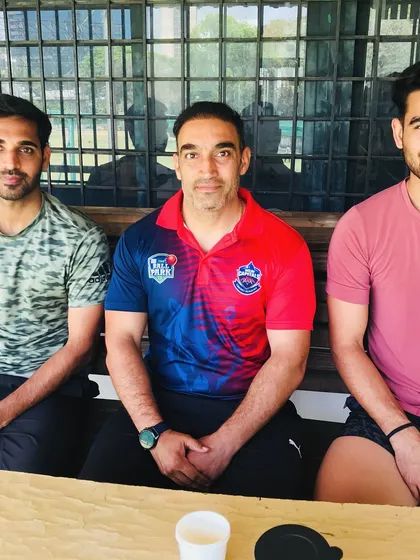 At the National Cricket Academy with international pacers Bhuvneshwar Kumar and Mukesh Kumar. Continuous learning is key, even for coaches.