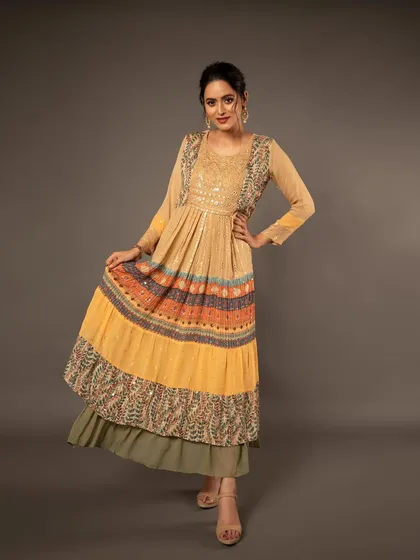 A full-length pose that displays the entire layered outfit, including the palazzo pants underneath. It gives a complete picture of the ensemble for a lookbook.