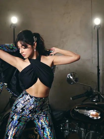 This series of shots captures the full biker-chic look I created for Divya Khosla Kumar's 'Yaariyan 2' promotions. The sequined jacket and pants by Any Old Iron paired with a simple black top created a cool, modern promotional style.