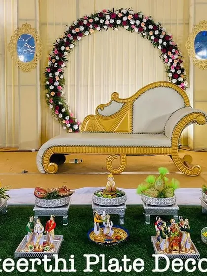 A beautiful seerup for an engagement, featuring a variety of dolls and decorated platters. The arrangement is designed to be both traditional and visually appealing.