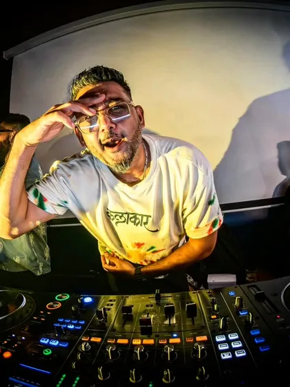 An artist's view from the DJ console. This fisheye shot captures the intensity and focus I bring to my live sets, connecting with the audience through music.