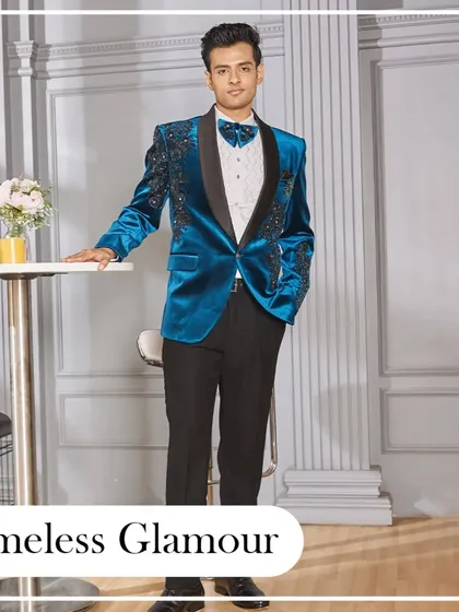Timeless glamour. A full-length shot of the electric blue velvet tuxedo, perfect for a black-tie event or a grand reception where you want to stand out.