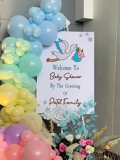 Every grand celebration needs a beautiful welcome. This personalized sign, framed by a colorful balloon garland, greeted guests from the Patel family and set the theme from the very beginning.
