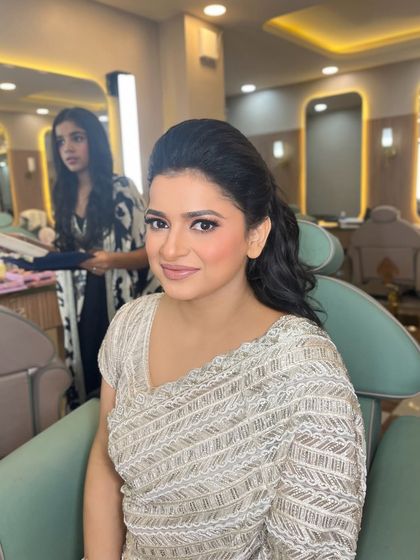 An elegant makeup look for a sophisticated client. This was done by my talented artist Sunaina, showcasing our team's skill in creating timeless beauty.
