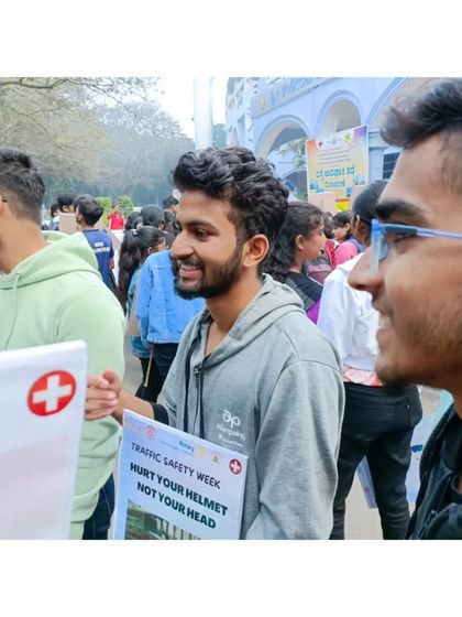 Participating in the rally, spreading the message of road safety.