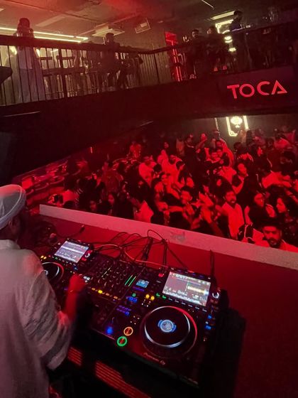 A behind-the-console view of the party at Toca.