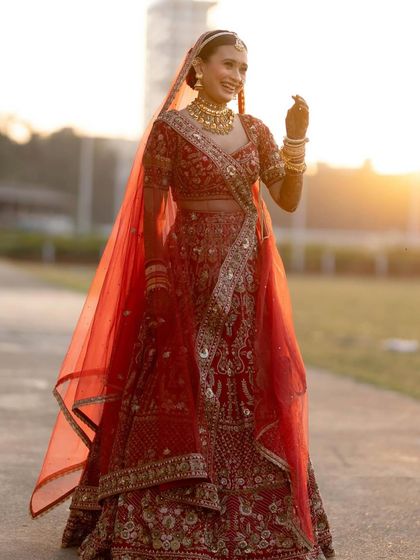 A beautiful bride against the golden hour sunset. We believe in makeup that enhances, not masks, and this subtle yet powerful look is a testament to that philosophy.