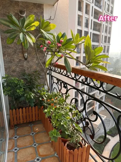 Even a small balcony can become a charming nook. We used warm wooden planters to add structure and character, turning this cozy corner into a space full of life.