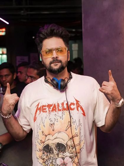 The power and aggression of metal music fuels my energy. Here I am, ready to channel that fire into a high-octane DJ set.