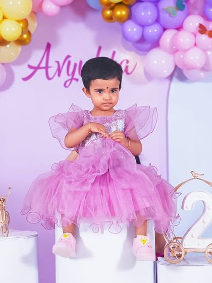 A charming 'Winnie the Pooh' themed birthday party, with rustic decor, character cutouts, and honey pot props, creating a sweet and cozy atmosphere.