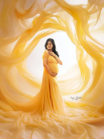 Wrapped in sunshine. Using vibrant, flowing fabrics is one of my favorite ways to create dynamic and artistic maternity portraits that are full of life and energy, celebrating your beautiful bump.