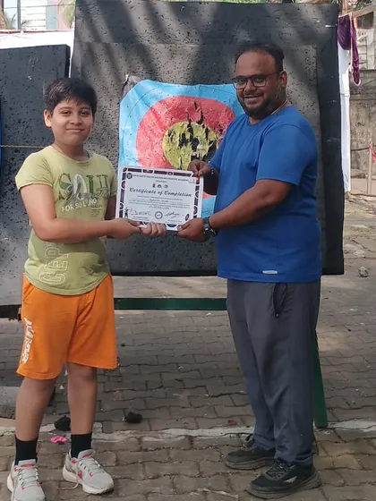 Another young student from the November batch with his certificate. Each certificate represents a journey of learning and improvement.