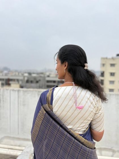 A beautiful back shot of a client in one of my sarees, showcasing the lovely blouse and the drape of the pallu.