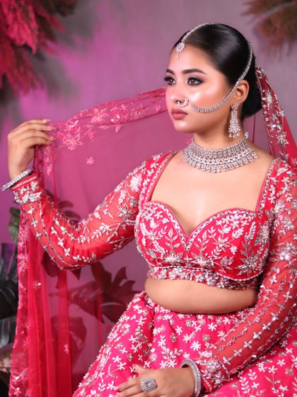 Every bride deserves to feel like a queen. This stunning transformation by our student features a bold eye, soft lips, and a beautiful pink lehenga.