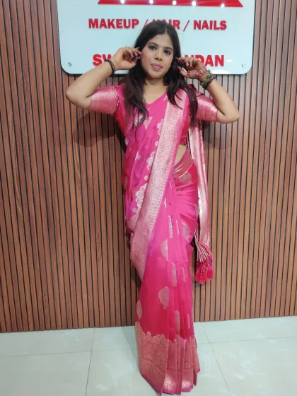 Another shot of my self-draped pink saree. I love the way the light catches the silver zari work.