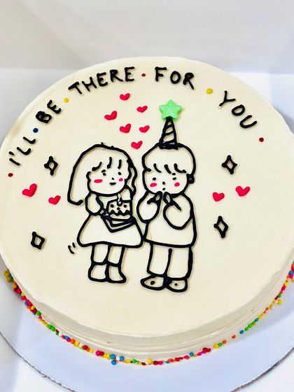 A super cute birthday cake with a hand-drawn illustration of a couple. The message 'I'll be there for you' adds a sweet, personal touch.