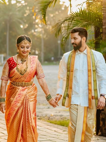 The couple taking a walk after the ceremony. The makeup looks just as fresh outdoors in natural light.