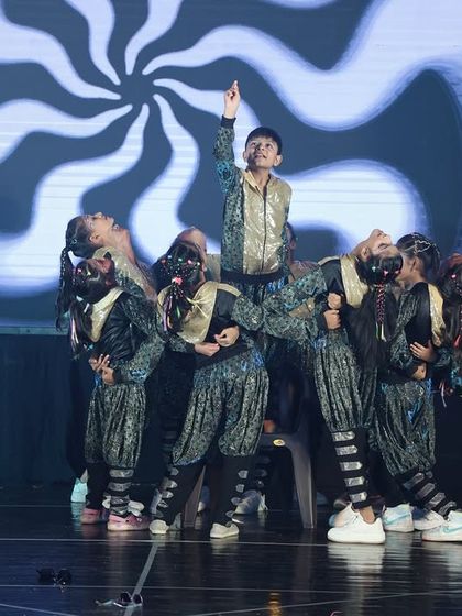 A powerful moment from our "Jhoome Jo Pathaan" act. The choreography included complex group formations and lifts, bringing the energy of the film to our stage.