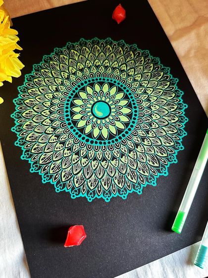 You are a work of art in progress. This mandala uses a cool palette of turquoise and lime green, creating a design that feels both vibrant and calming.