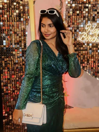 A stylish pose against our "Happy Birthday" neon sign and sequin wall. Every corner of our theatres is an Instagram-worthy spot, perfect for capturing your birthday look.
