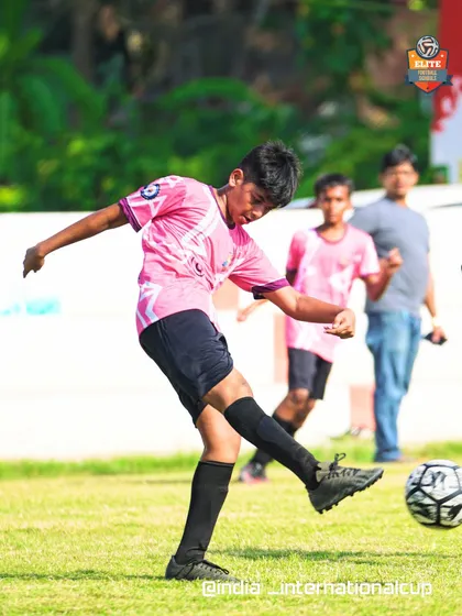 An action shot from our Goa tour, with a player executing a perfect strike. This is the result of our elite training.
