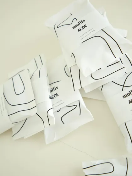 The minimalist black and white packaging for the corporate order.