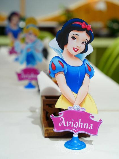 A close-up of our custom princess-themed table centerpieces. We use details like these to carry the theme throughout the entire space, creating a cohesive and immersive experience.